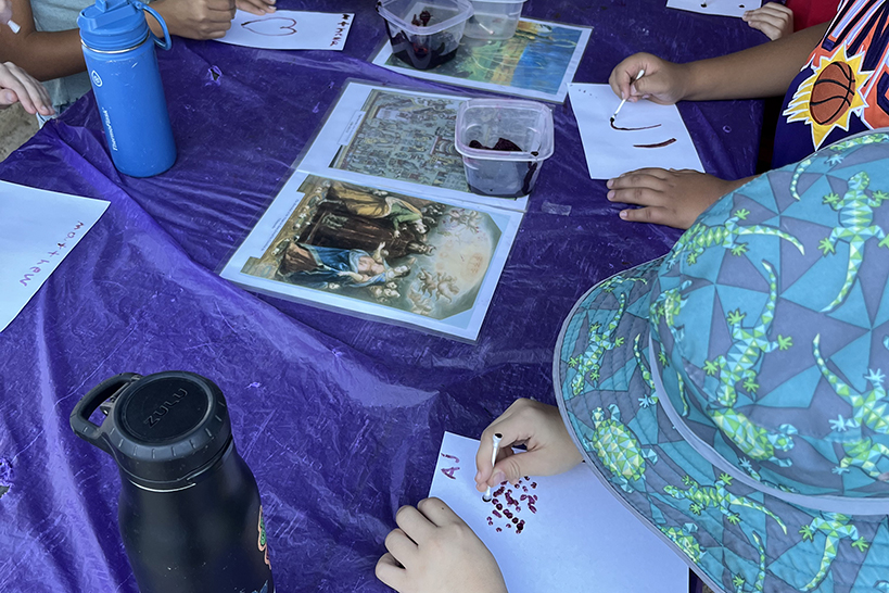 Students paint pictures