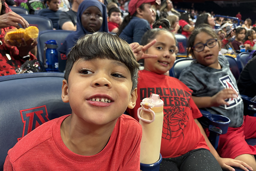 Students get close to the camera for a photo